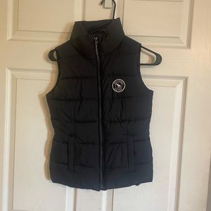 Abercrombie kids navy puffer vest with pink interior